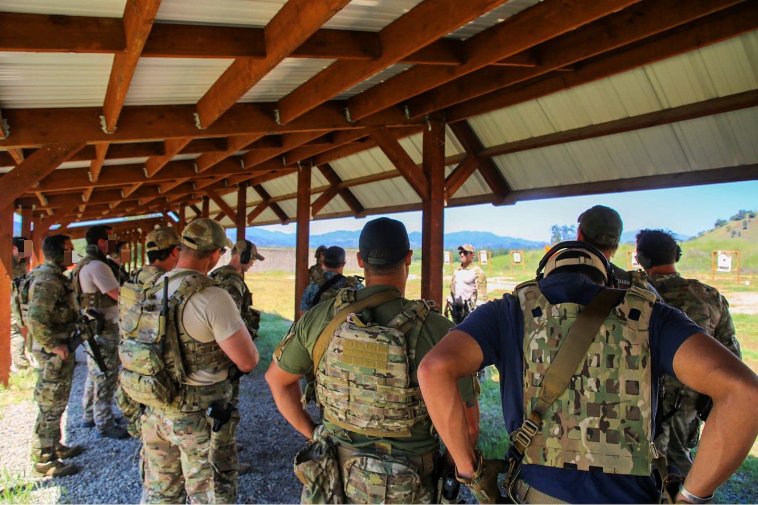 Instructor briefing a small group before a training serial
